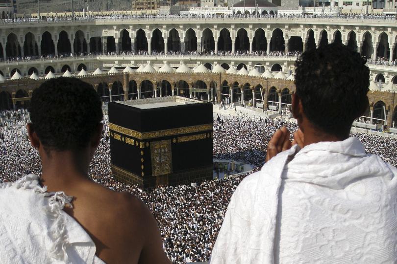 Muslim pilgrims praying infront of the Kabah at the Sacred Mosque in Makkah, towards which all Muslims face when they pray.