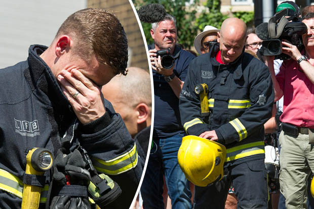 London firefighters weep during minute's silence held for victims of Grenfell Tower fire tragedy. Image courtesy of Daily Star.