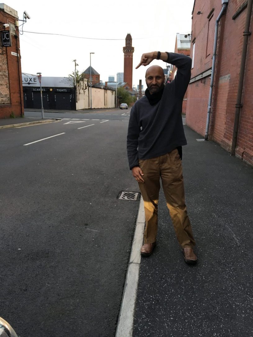 Standing with the tower of HM Prison Manchester in the distance behind me