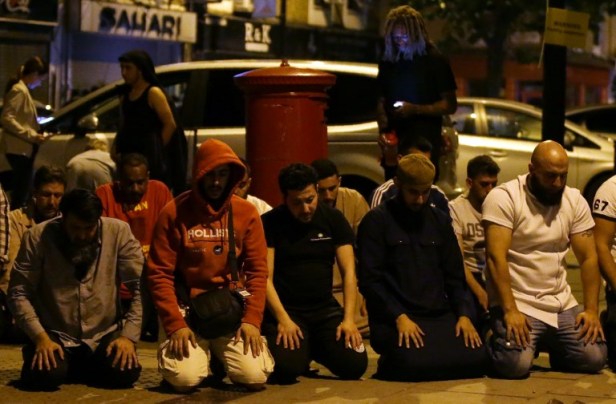Muslims praying outside FInsbury Park Mosque in wake of terrorist attack, June 2017